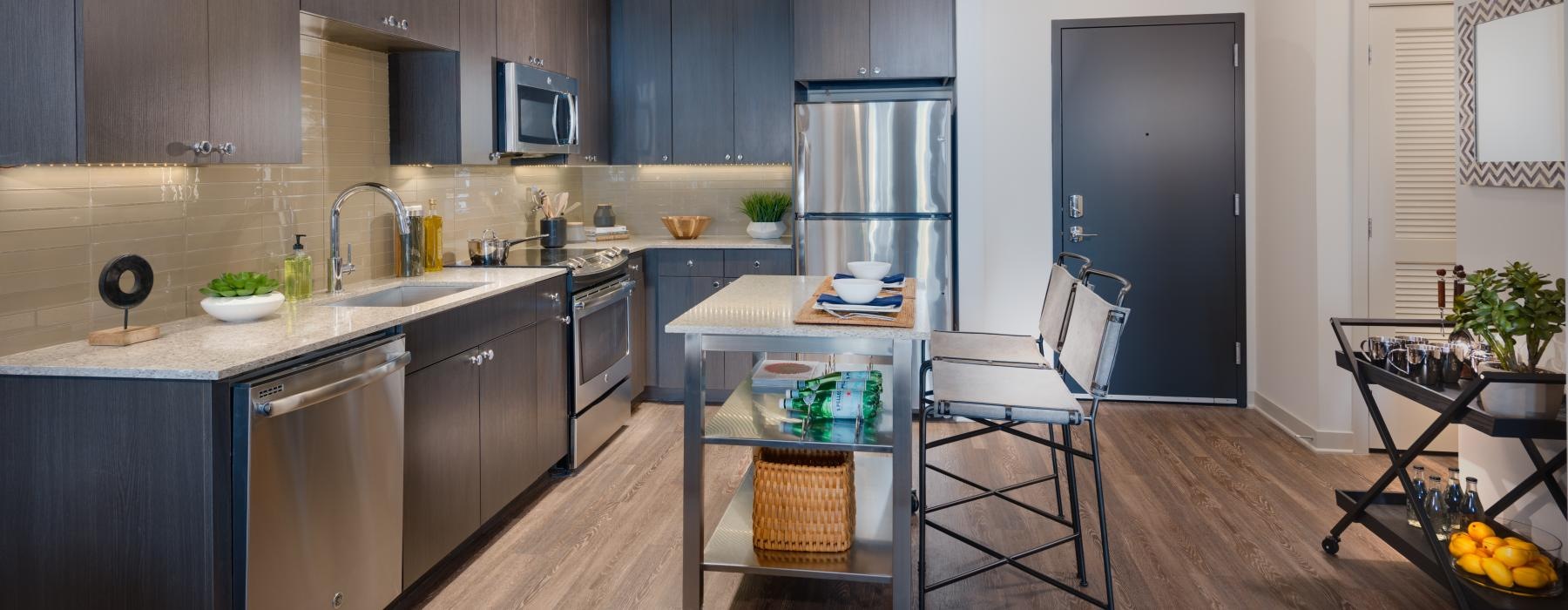 a kitchen with a table and chairs